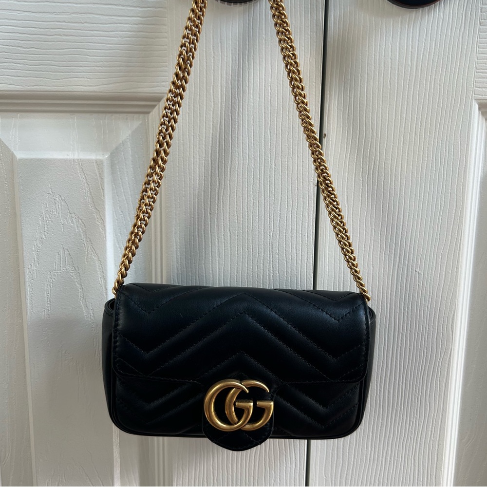 Black Quilted Shoulder Bag with Gold Chain and Hardware
